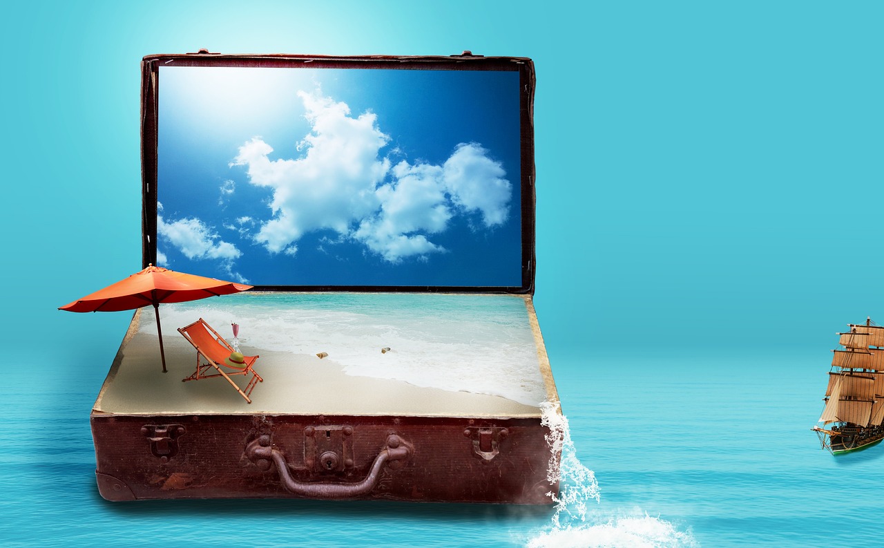 A vintage suitcase sitting on a beach, symbolizing travel freedom and adventure.